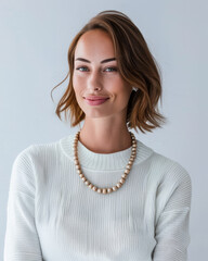 Canvas Print - Portrait of a smiling young woman looking at the camera with a copy space background