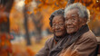 © SashaMagic - Elderly couple enjoying autumn park