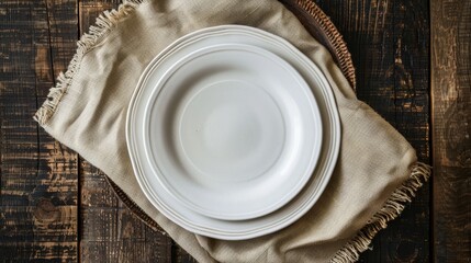 A white plate placed on top of a napkin