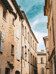 Wall Mural - Street view of old village Uzes in France