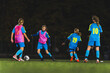 © PoppyPix - teenage Caucasian girls playing football at the late evening practice, full shot, teenage lifestyle. High quality photo