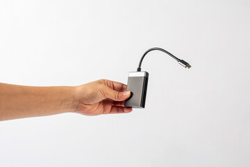 Wall Mural - Black card reader in hand on a white background