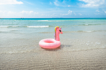 Wall Mural - Pink rubber ring and beach scenery on the island