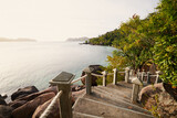 Fototapeta Sawanna - Stairs leading to idyllic beach. Coastal landscape on coast of Seychelles.