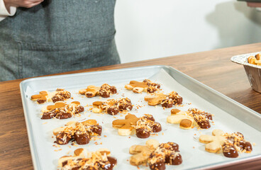 Wall Mural - Chocolate-Dipped Gingerbread Men with Golden Toasted Coconut