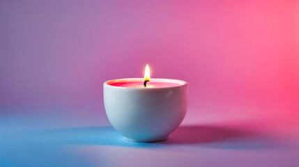 Wall Mural - Lit candle inside white cup that is sitting on purple background.