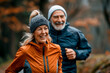 © Fernando Cortés - Elderly Couple Embracing Active Lifestyle: Smiling Seniors Jogging Outdoors Together in Nature for Healthy Retirement Fitness