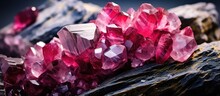 A Cluster Of Vibrant Red Crystals Adorn A Rock, Resembling A Bouquet Of Flowers In Shades Of Pink, Violet, And Magenta. The Scene Evokes A Glamorous And Colorful Event In Nature