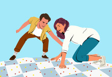 Young Couple Enjoying A Playful Game Of Twister Outdoors, Sharing A Joyful Moment