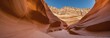 Antelope Canyon. Natural landscape. Wavy, orange mountains and sand. Panorama banner. Concept for design, travel, tourism, paintings, wallpaper.