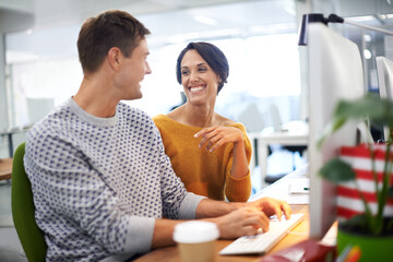 Poster - Computer, discussion and businessman with woman in office of startup company with creative career. Conversation, technology and team of graphic designers working on project with desktop in workplace.