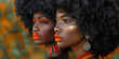 two african women with orange lipstick