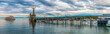Great large panorama of the pier leading to the famous Imperia statue at the harbour entrance of Constance (Konstanz) by Lake Constance (Bodensee) in Germany. A ship is approaching.