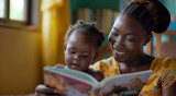 Fototapeta Sport - Festive Holiday Storytime: African Mom and Child Reading at Christmas