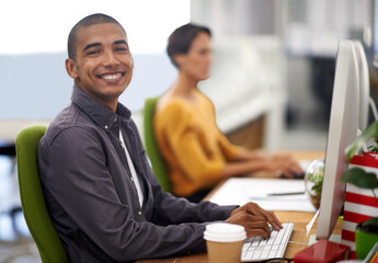 Poster - Portrait, smile and computer for happy employee, office and typing at desk in workspace. Technology, keyboard and businessman or journalist person, writing and working for company project online