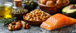 Healthy fats, omega-3 nutrition. Avocado, salmon fish, nuts, seeds, oil, olives. Close up. Food and health theme, mediterranean diet. 
