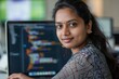 © Moments Captured - Beautiful indian woman programmer web developer focused and confident working on laptop writing code programming business woman worker in modern office working in casual clothes, Generative AI
