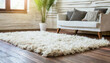 White shaggy carpet on brown wooden floor