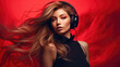 Young woman with gorgeous lush hair listening to music with headphones