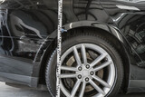 Fototapeta Sport -  Accident Inspector Inspect damage car. Car insurance agent examining damage.