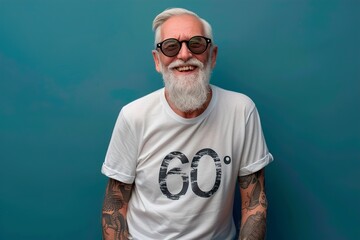 A man with a beard and glasses is wearing a white shirt with the number 60 on it