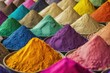 Colored powders at market in India. Colorful piles of powdered dyes used for Holi festival. Vibrant pattern background