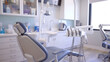 A Dental Assistant Sterilizing dental instruments and preparing treatment rooms for procedures