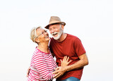 Fototapeta Łazienka - woman man outdoor senior couple happy lifestyle retirement together smiling love old nature mature