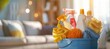 © masyastadnikova - Basket with cleaning items and cleaner on blurry home interior background, Cleaning service. banner