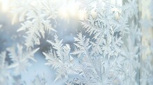 **A Beautiful Close-up Of Frost On A Window Pane. The Delicate Ice Crystals Create A Stunning Winter Scene.
