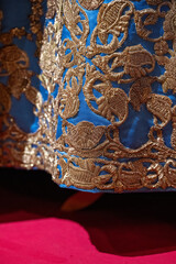 Wall Mural - Gold embroidery on the royal dress.