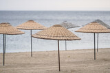 Fototapeta  - Sunbeds, Umbrellas and Hammocks in a beach