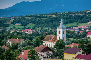 Poster - Aerial view with church of village of Bran commune area in Romania