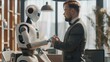 © Rustam - Robot and man are handshaking.