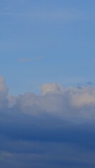 Canvas Print - Dramatic sky with storm cloud on a cloudy day time lapse.