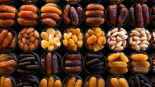 A neatly organized assortment of various nuts and dried fruits with a diverse color palette.