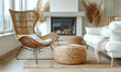 A charming arrangement comprising a rattan lounge chair, wicker pouf, and white sofa arranged by a cozy fireplace.