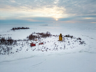 Sticker - Tasku island in Raahe during winter time. The beacon tower was built in 1853.