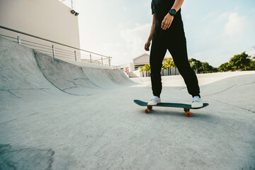 Wall Mural - Skateboarder skateboarding at skatepark in city