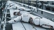 © Salander Studio - human like robots lying on a conveyor belt in an asembly factory
