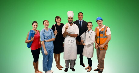 Wall Mural - Image of group of professionals smiling over green background