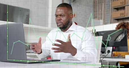 Sticker - Graph processing over african american casual businessman having laptop image call in office