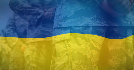 Sticker - Image of flag of ukraine over midsection of diverse male soldiers