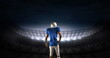 Rear view of an American football athlete limbering up preparing to enter a digital stadium 4k