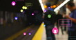 Image of social media reactions over blurred train station