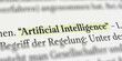 Das Wort Artificial Intelligence im Buch mit Textmarker markiert
