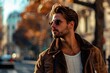© MediaRaw - A man wearing a brown jacket and sunglasses is standing on a city street
