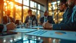 © Anastasiia - Strategic Business Meeting at Sunset, professional team engages in a strategic discussion around a conference table, with a warm sunset illuminating the modern office