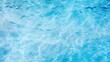 Surface of blue swimming pool. Background of blue ripped water in swimming pool