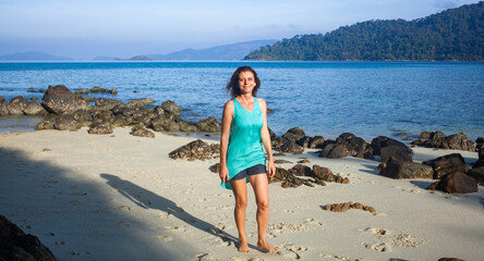 Wall Mural - woman on a tropical beach in Thailand